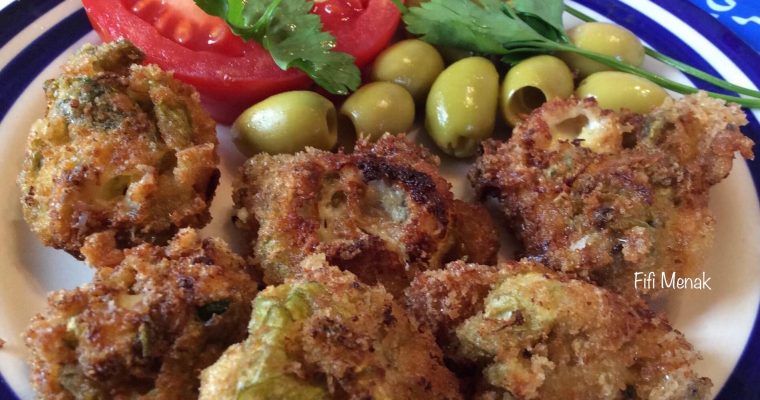 Beignets de fleurs de courgettes au fromage fondu et oignon