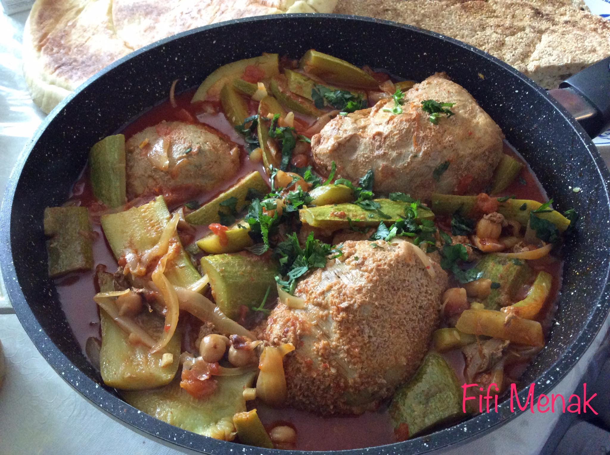 Panse farcie en sauce aux courgettes et oignons