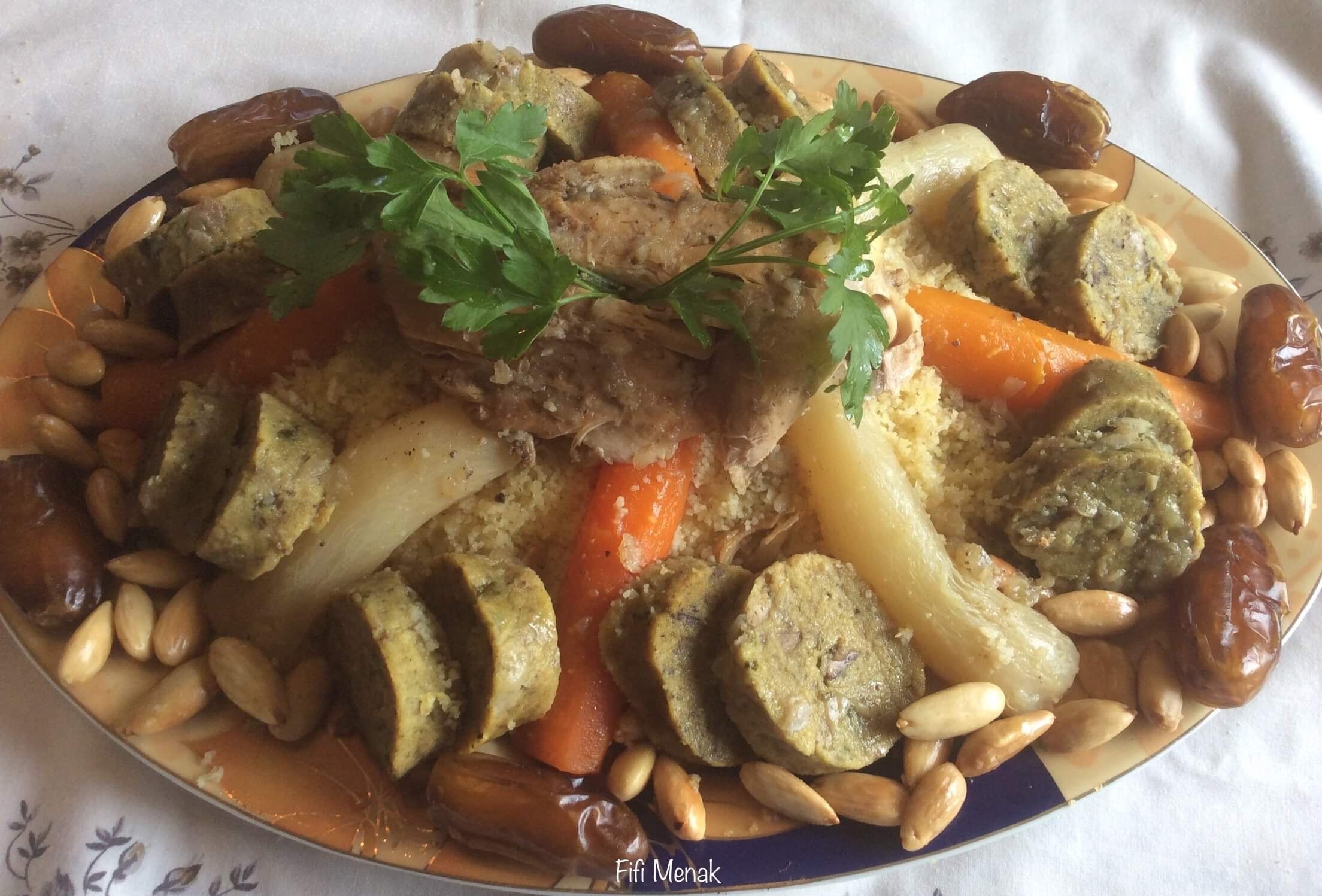 Couscous en sauce avec boudin au foie de volaille (Taam be taamir)